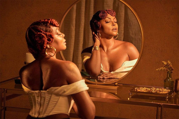 Taraji P Henson poses at a vanity mirror
