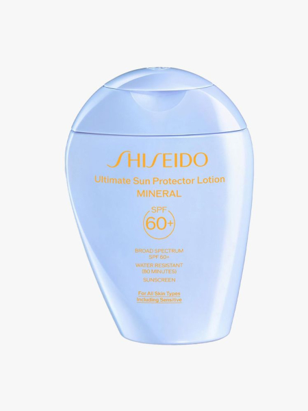 A blue bottle of Shiseido Ultimate Sun Protector Lotion Mineral SPF 60+ on a light gray background