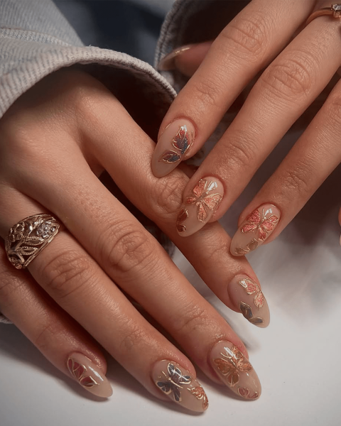 Gold butterfly nail art