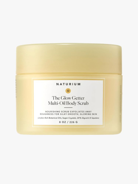 Naturium The Glow Getter Multi-Oil Body Scrub in branded tub component on a light gray background